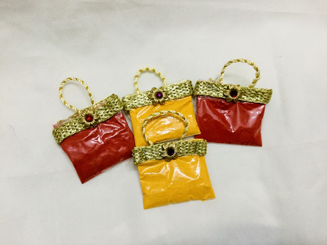 Buy Haldi Kumkum Packets In Purse Style online from Viprahandicraft