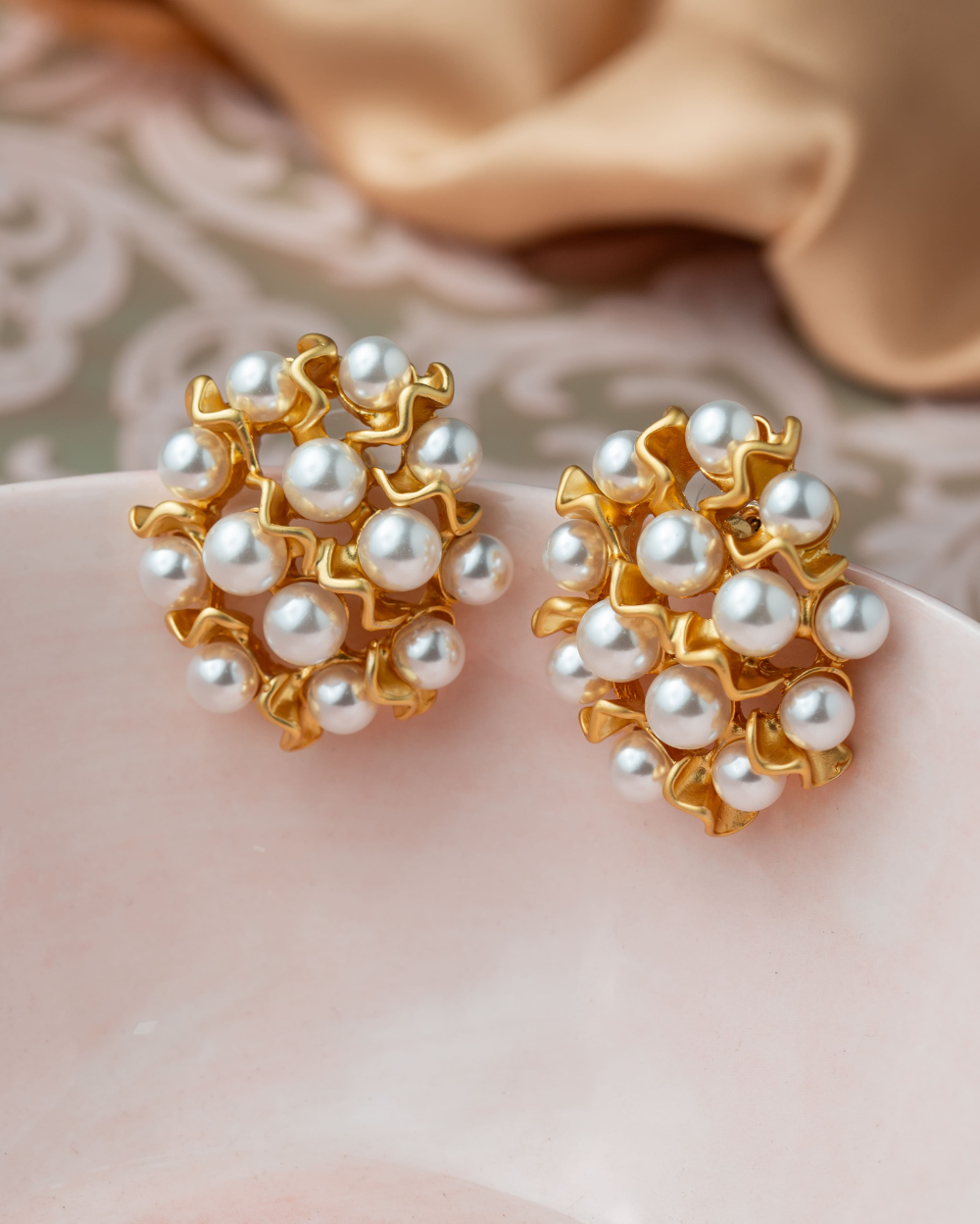 Round Pearl Earrings with Intricate Golden Lace Design