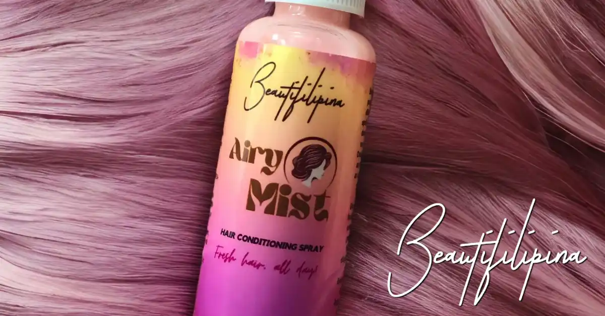 Beautifilipina Airy Mist Hair Conditioning Spray laying atop a bed of healthy pink hair