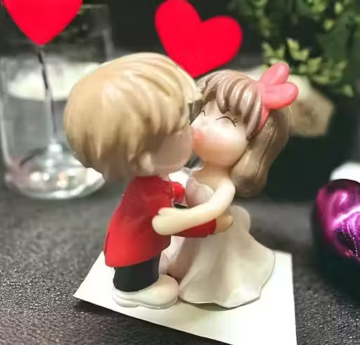 Create lasting memories with this unique valentine's gift day .the kissing couple showpiece