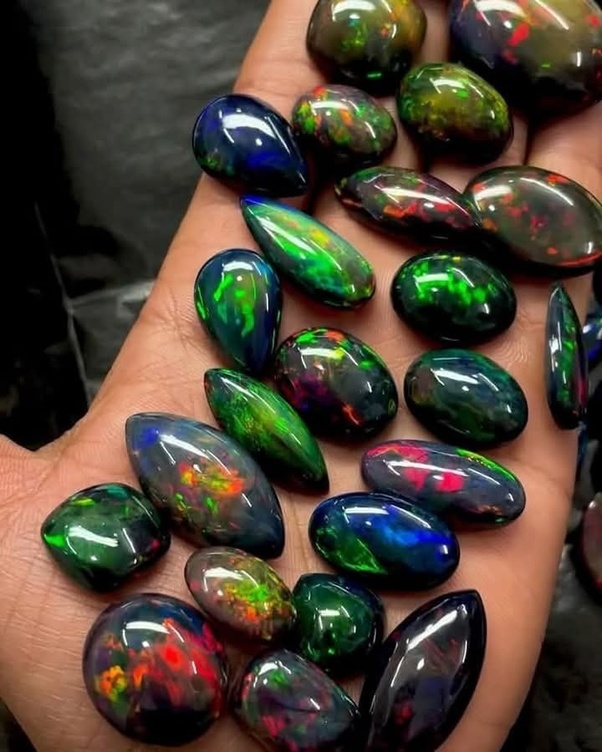Ethiopian Opal, also known as Welo Opal, is a vibrant and affordable gemstone renowned for its immense beauty. This precious gem of the Opal family is distinguished by its "flaming body colors," which appear in shades of yellow, orange, red, brown, and green. Its distinctive "play-of-color"—the shimmering interplay of hues—makes it a truly exceptional addition to any jewelry collection.